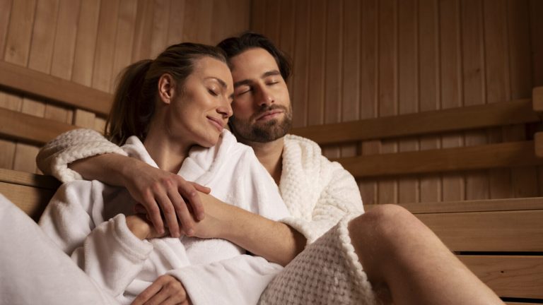 close-up-couple-relaxing-sauna